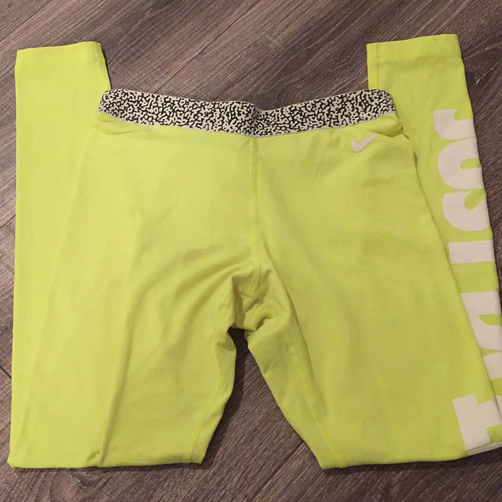 Neon yellow Nike running leggings